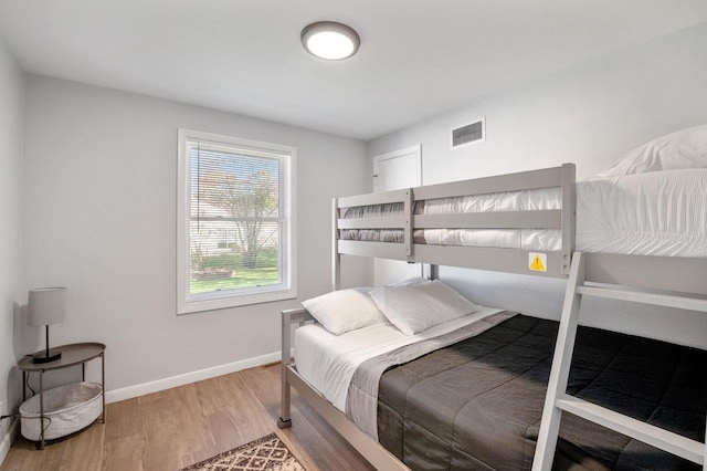 1201 Redwood Dr, Green Bay, WI 54304 - bedroom featuring wood finished floors and baseboards