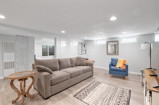 1201 Redwood Dr, Green Bay, WI 54304 - living room featuring a heating unit, recessed lighting, light wood-type flooring, and baseboards