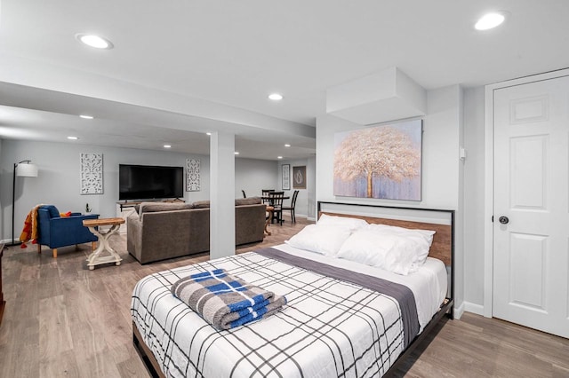 1201 Redwood Dr, Green Bay, WI 54304 - bedroom featuring wood finished floors, recessed lighting, and baseboards