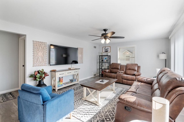 1201 Redwood Dr, Green Bay, WI 54304 - living area with wood finished floors, a ceiling fan, and baseboards