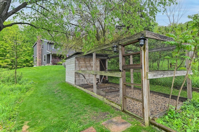 5458 Cascade Dr, West Bend, WI 53095 - view of grassy yard with exterior structure and an outdoor structure