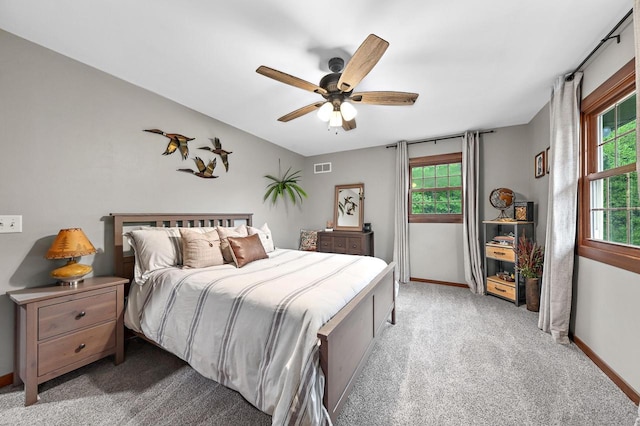 5458 Cascade Dr, West Bend, WI 53095 - carpeted bedroom featuring baseboards and ceiling fan