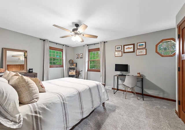 5458 Cascade Dr, West Bend, WI 53095 - carpeted bedroom featuring baseboards, an office area, and ceiling fan