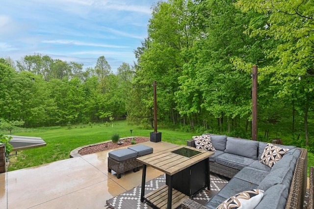 5458 Cascade Dr, West Bend, WI 53095 - view of patio with outdoor lounge area and a wooded view