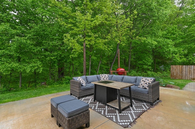 5458 Cascade Dr, West Bend, WI 53095 - view of patio with an outdoor living space and a view of trees