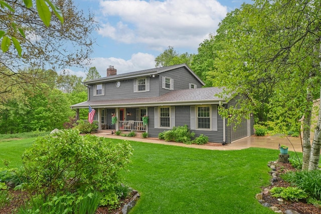 5458 Cascade Dr, West Bend, WI 53095 - view of front facade with a porch, a chimney, concrete driveway, and a front yard