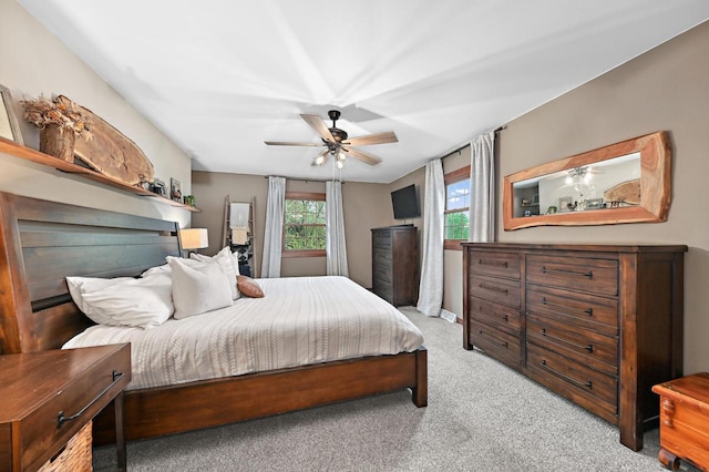 5458 Cascade Dr, West Bend, WI 53095 - carpeted bedroom featuring a ceiling fan