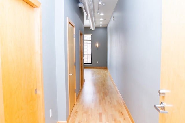 615 W Main St Unit 205, Madison, WI 53703 - hallway with light wood-type flooring and baseboards