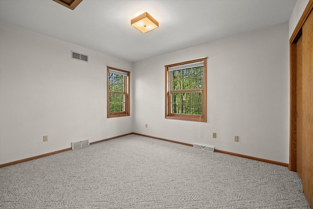 5287 Pleasant Hill Rd, Hartford, WI 53027 - unfurnished bedroom with carpet flooring and baseboards
