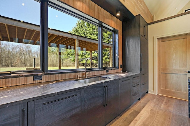 W4310 33rd St, Necedah, WI 54646 - bar area with a sink and light wood-style floors
