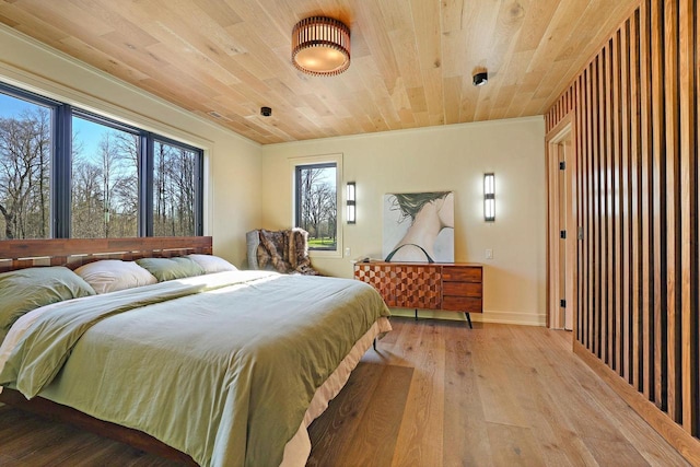 W4310 33rd St, Necedah, WI 54646 - bedroom featuring wooden ceiling, light wood-type flooring, and baseboards