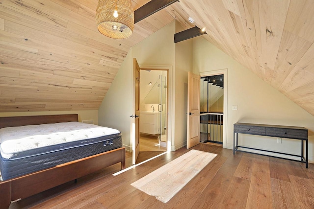 W4310 33rd St, Necedah, WI 54646 - bedroom featuring wooden ceiling, vaulted ceiling, wood finished floors, and baseboards