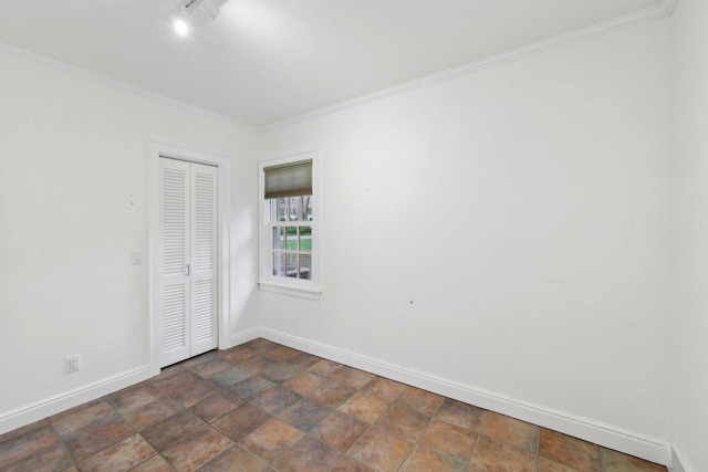 923 Swarthmore Ct, Madison, WI 53705 - empty room featuring baseboards, crown molding, and stone finish flooring