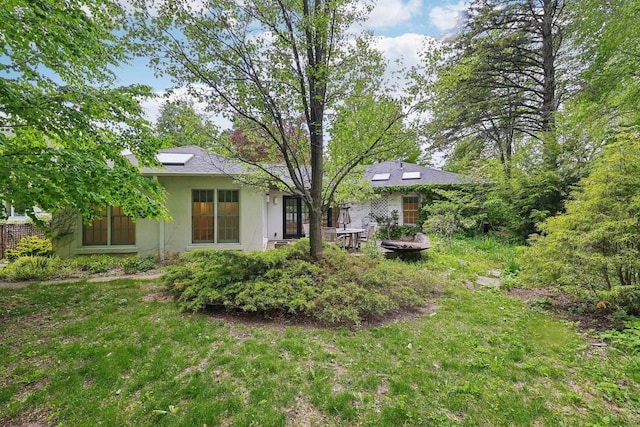 923 Swarthmore Ct, Madison, WI 53705 - view of green lawn with a fire pit
