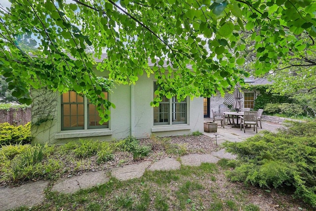 923 Swarthmore Ct, Madison, WI 53705 - back of house with a patio area and stucco siding