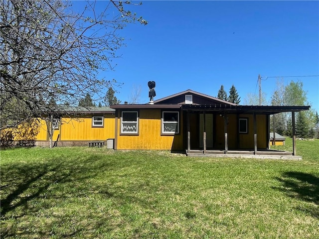 15735 N Park Rd, Butternut, WI 54514 - rear view of property featuring a lawn