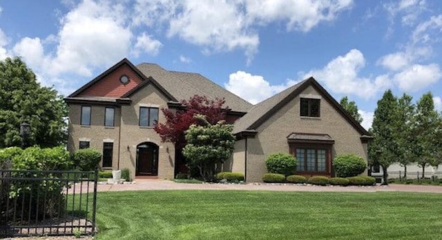 7601 S Cambridge Dr, Franklin, WI 53132 - view of front of property with a front lawn