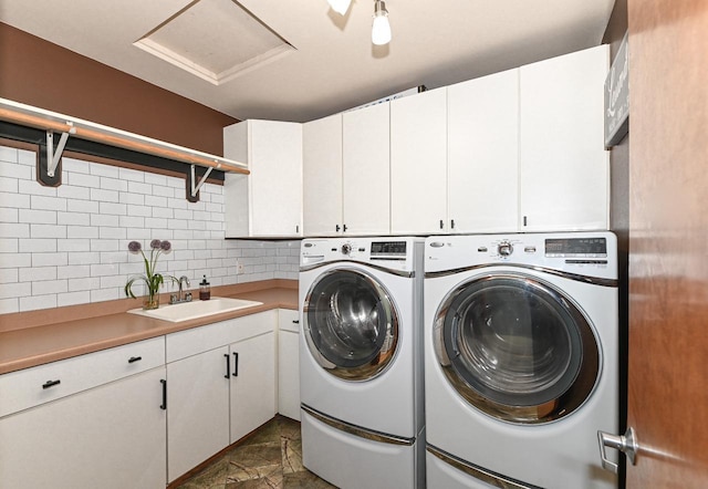7601 S Cambridge Dr, Franklin, WI 53132 - clothes washing area with cabinet space, washing machine and dryer, and attic access