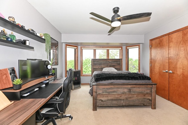 7601 S Cambridge Dr, Franklin, WI 53132 - bedroom with light colored carpet, an office area, a closet, and a ceiling fan