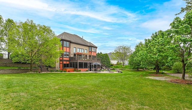 7601 S Cambridge Dr, Franklin, WI 53132 - rear view of house with stairs, a patio area, a lawn, and a sunroom