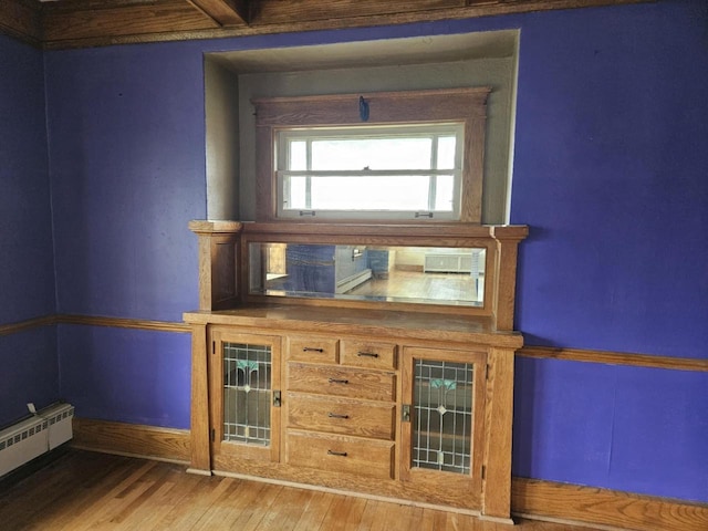 3513 Washington Ave, Racine, WI 53405 - bar area with baseboard heating and wood finished floors
