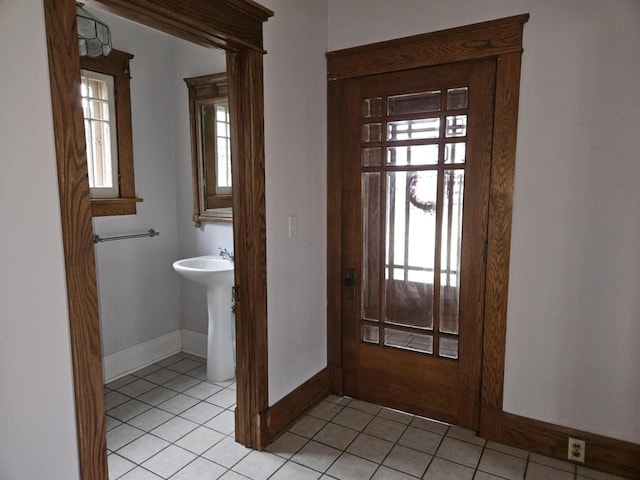 3513 Washington Ave, Racine, WI 53405 - bathroom with tile patterned floors and baseboards