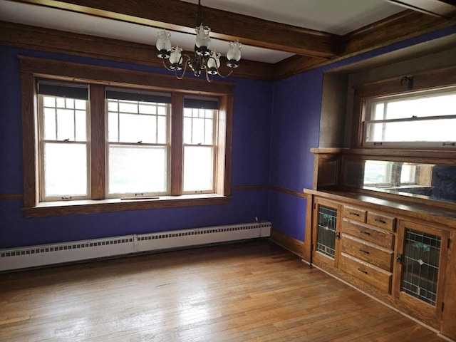 3513 Washington Ave, Racine, WI 53405 - unfurnished dining area featuring a baseboard heating unit, a chandelier, beamed ceiling, light wood-type flooring, and baseboards