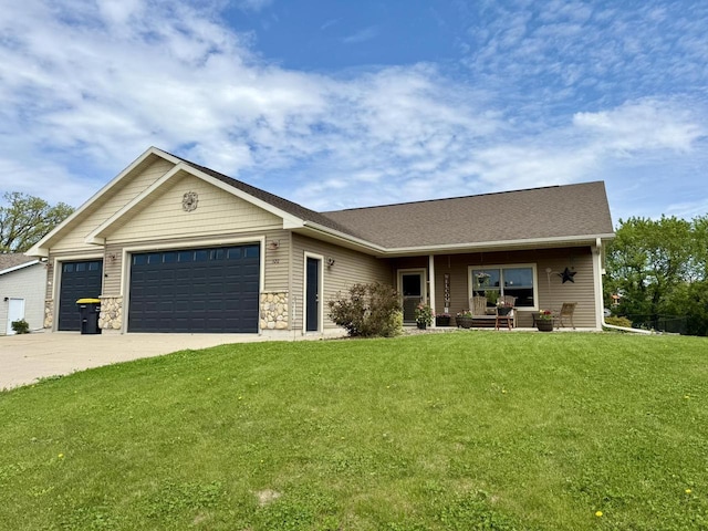 520 Alyssa St, Tomah, WI 54660 - view of front of house featuring a garage, a front lawn, concrete driveway, stone siding, and a porch