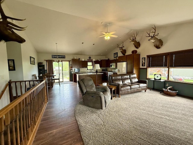 520 Alyssa St, Tomah, WI 54660 - living room with a ceiling fan, dark wood-type flooring, and high vaulted ceiling