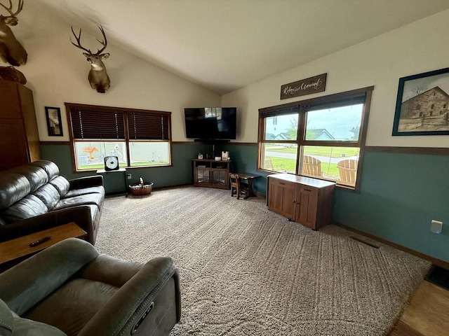 520 Alyssa St, Tomah, WI 54660 - living area featuring carpet floors and vaulted ceiling