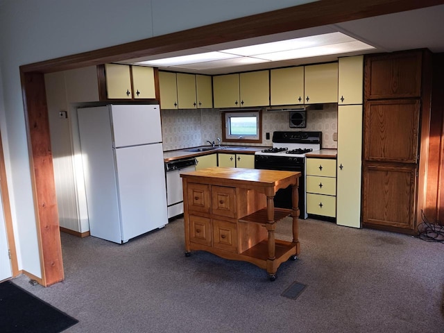 5544 Elm Rd, Pittsville, WI 54466 - kitchen with white appliances, dark colored carpet, butcher block counters, and backsplash