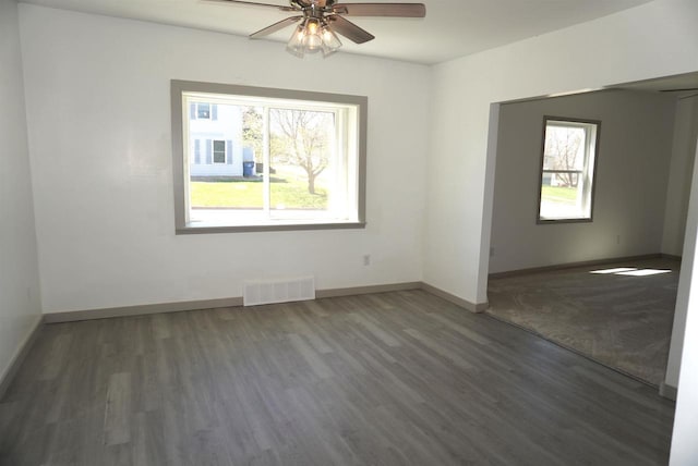 501 N Prospect St, Merrill, WI 54452 - unfurnished room with ceiling fan, healthy amount of natural light, baseboards, and wood finished floors