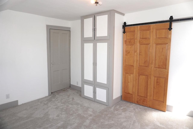 501 N Prospect St, Merrill, WI 54452 - additional living space with carpet floors and a barn door