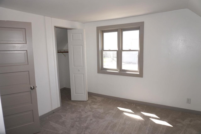 501 N Prospect St, Merrill, WI 54452 - unfurnished bedroom featuring carpet flooring, a closet, and baseboards