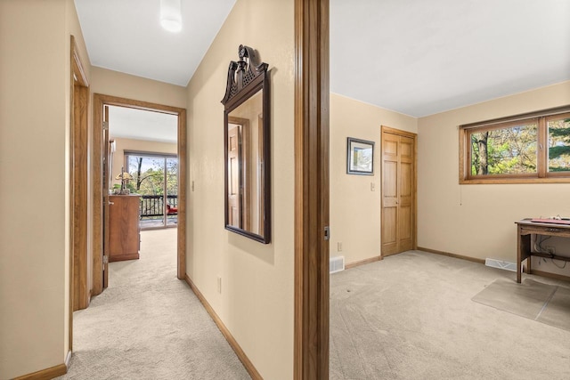 528 Park Ave, Waupaca, WI 54981 - corridor featuring light carpet and baseboards