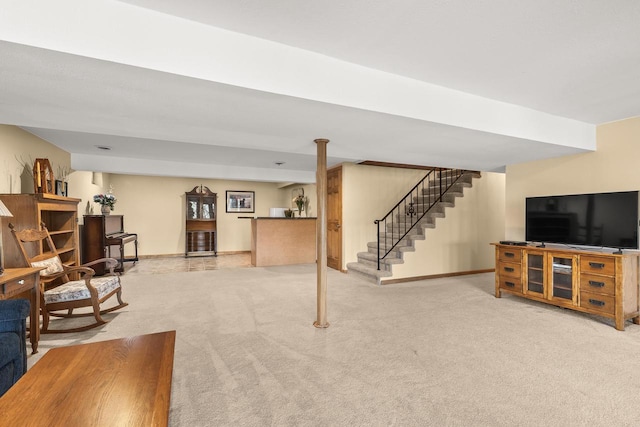 528 Park Ave, Waupaca, WI 54981 - carpeted living room with baseboards and stairs
