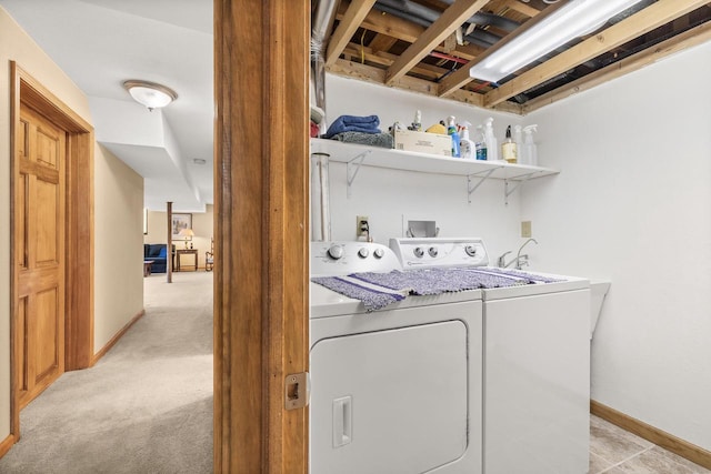 528 Park Ave, Waupaca, WI 54981 - washroom with washing machine and dryer, baseboards, and light colored carpet