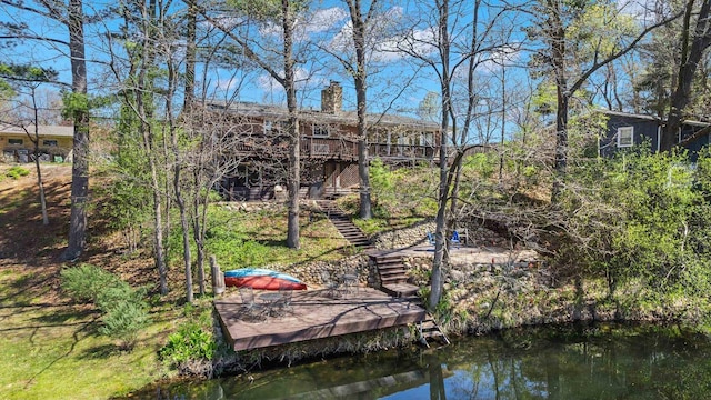 528 Park Ave, Waupaca, WI 54981 - dock featuring stairs and a wooden deck