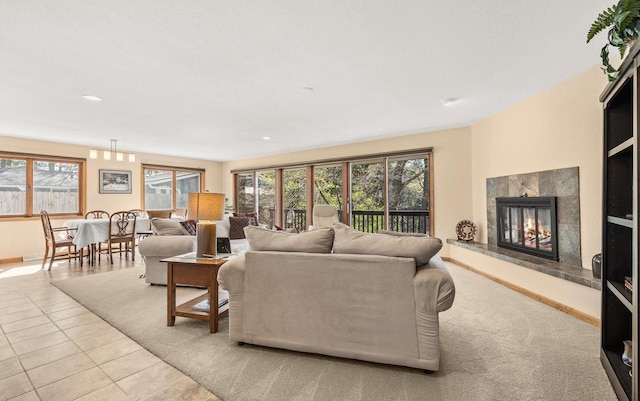 528 Park Ave, Waupaca, WI 54981 - tiled living area with plenty of natural light, a fireplace, recessed lighting, and baseboards