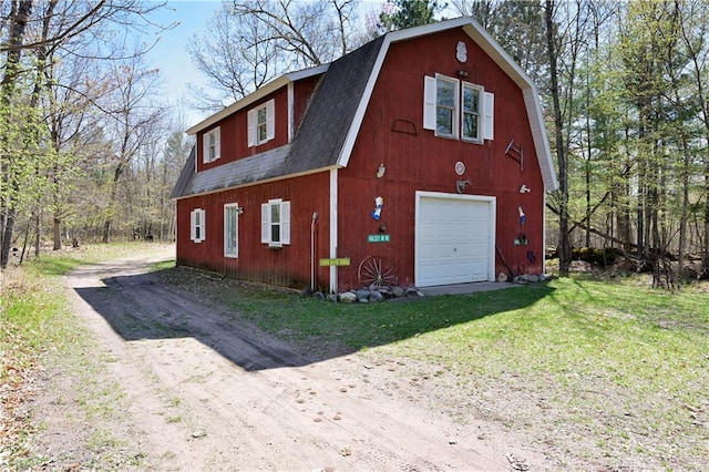 7266 County Road U, Danbury, WI 54830 - view of barn with driveway and a yard