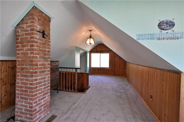 7266 County Road U, Danbury, WI 54830 - additional living space with wood walls, lofted ceiling, and carpet floors