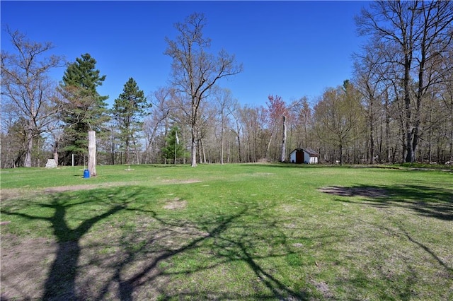 7266 County Road U, Danbury, WI 54830 - view of grassy yard featuring an outdoor structure and a shed