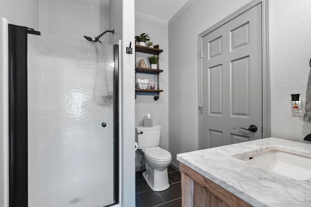 W6928 Westwood Dr, Fond Du Lac, WI 54937 - full bath featuring a shower stall, tile patterned flooring, vanity, toilet, and a textured wall