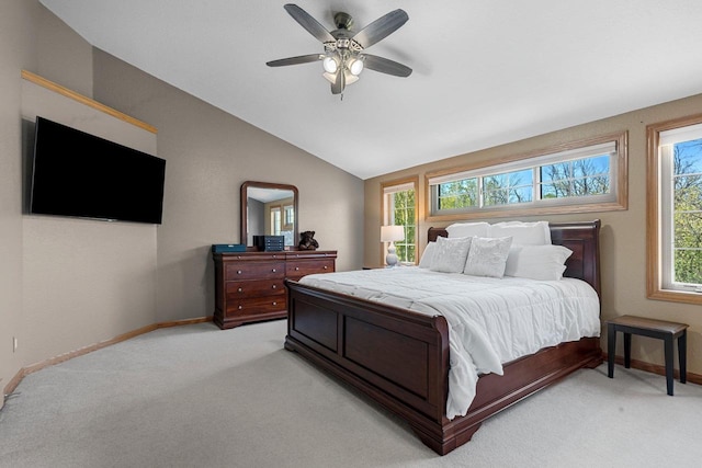 W6928 Westwood Dr, Fond Du Lac, WI 54937 - bedroom with multiple windows, light colored carpet, lofted ceiling, and baseboards