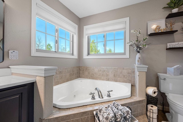 W6928 Westwood Dr, Fond Du Lac, WI 54937 - bathroom with a whirlpool tub, toilet, and vanity