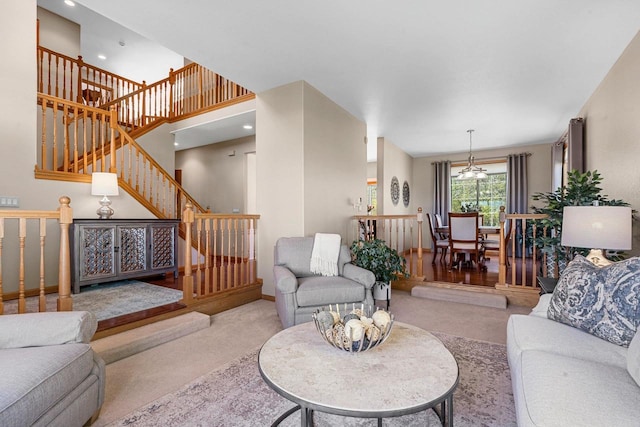 W6928 Westwood Dr, Fond Du Lac, WI 54937 - carpeted living room with stairway, baseboards, and recessed lighting