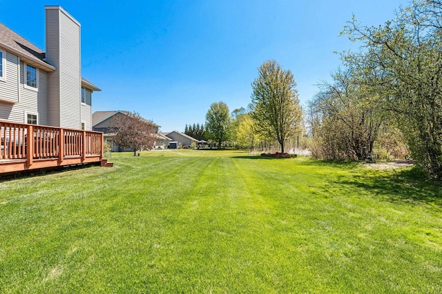 W6928 Westwood Dr, Fond Du Lac, WI 54937 - view of grassy yard featuring a deck