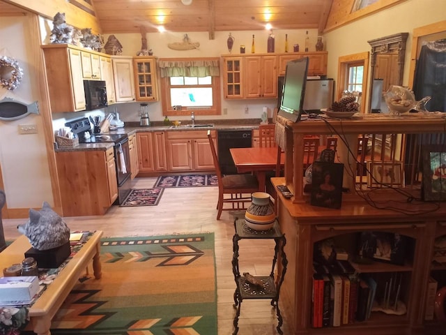 23540 State Highway 13, Cornucopia, WI 54827 - kitchen featuring black appliances, a sink, wood ceiling, light wood-style flooring, and vaulted ceiling