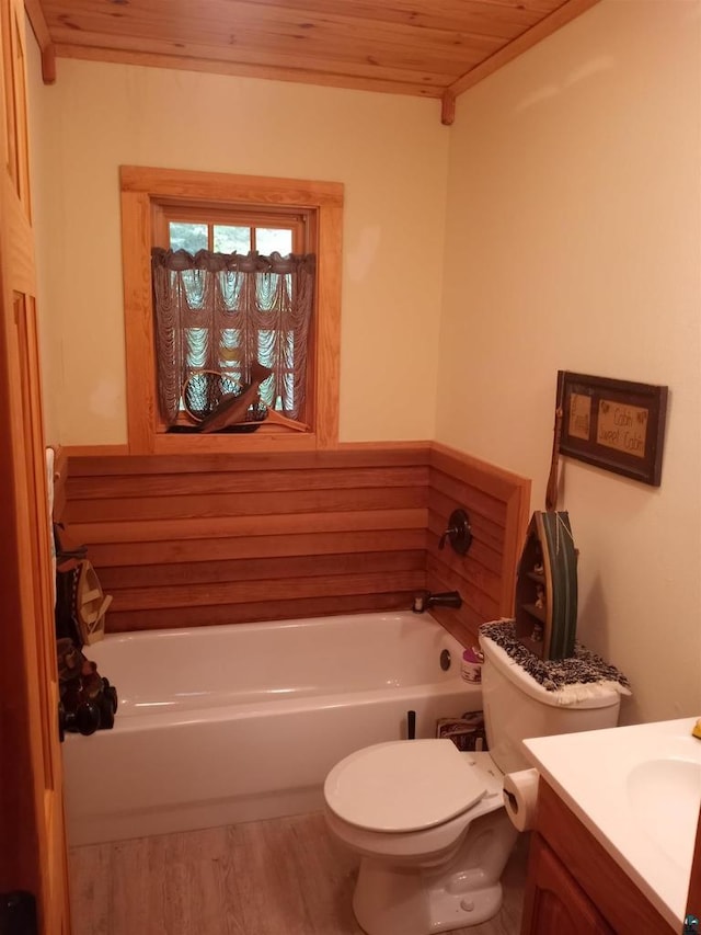 23540 State Highway 13, Cornucopia, WI 54827 - full bathroom with wood ceiling, a tub to relax in, toilet, vanity, and wood finished floors