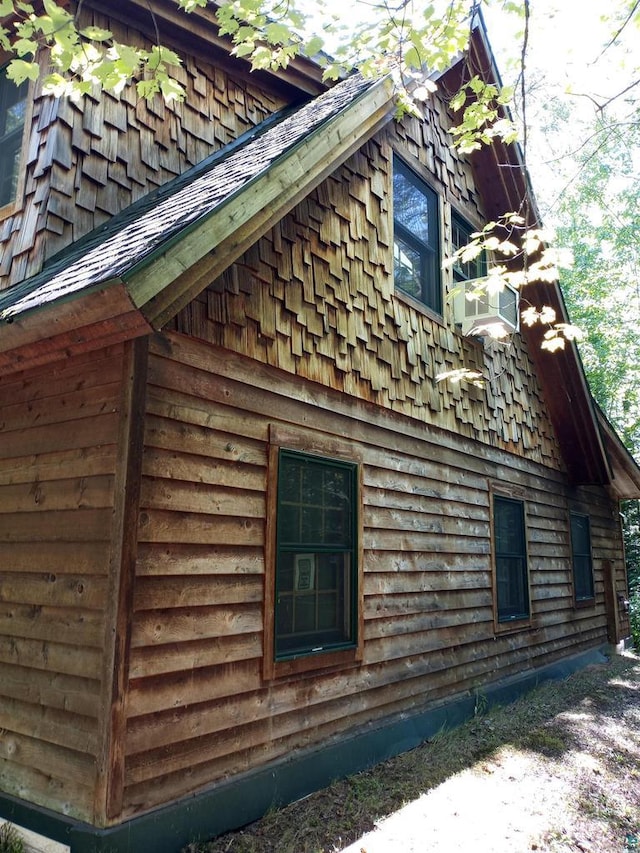 23540 State Highway 13, Cornucopia, WI 54827 - view of side of home with cooling unit